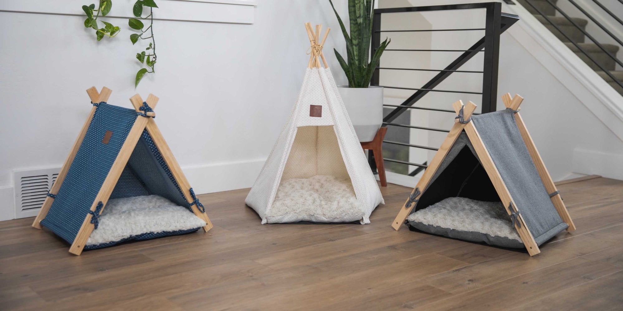 A collection of Pickle & Polly Pet Tents and Pickle & Polly Pet Teepee Beds.