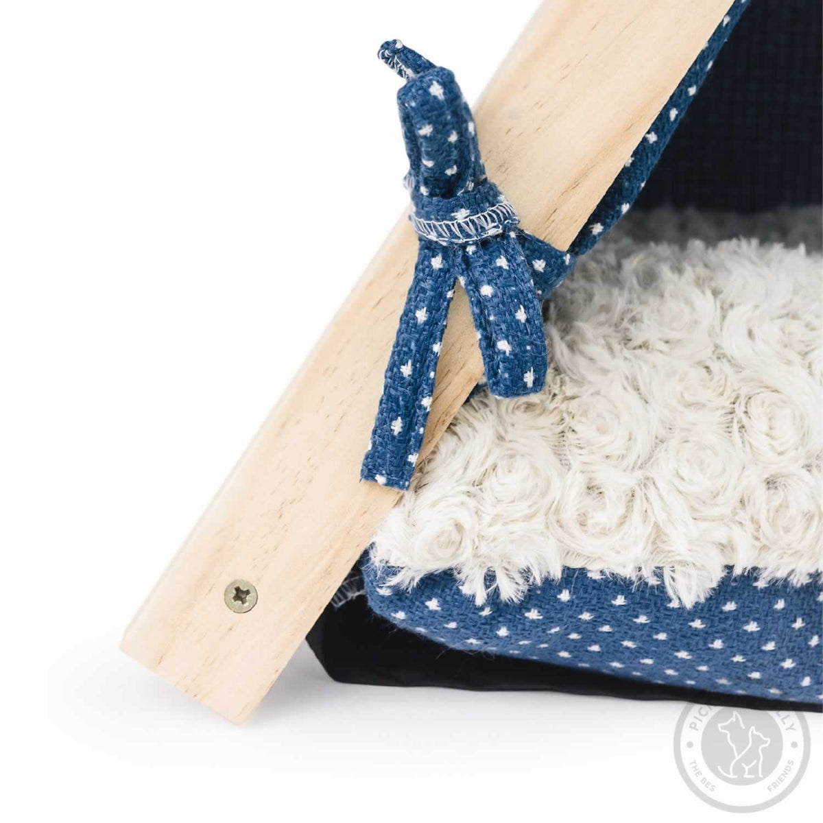 A close-up of the cushion and frame of a Pickle & Polly Pet Tent (Blue).