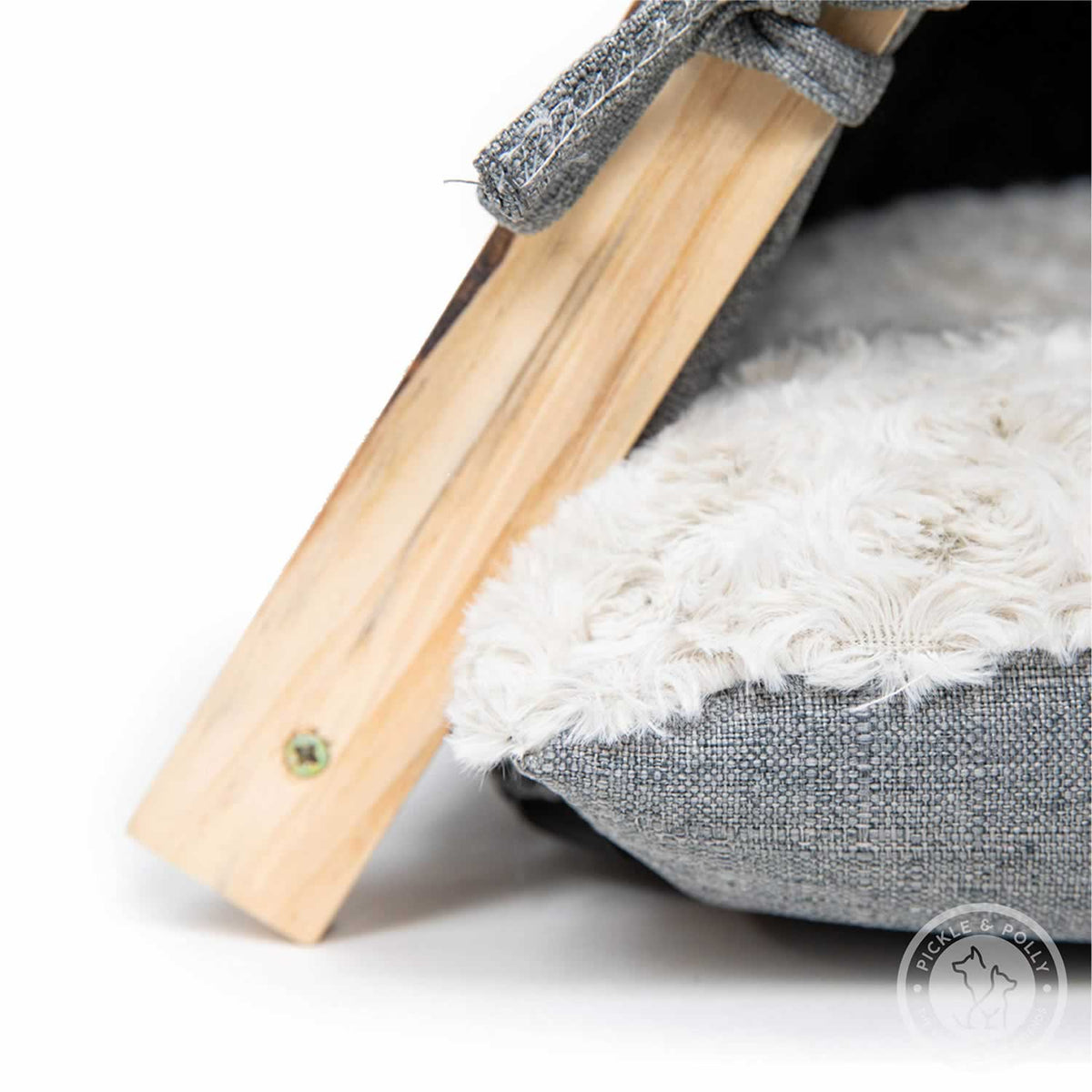 A close-up of the cushion and frame of a Pickle & Polly Pet Tent (Gray).