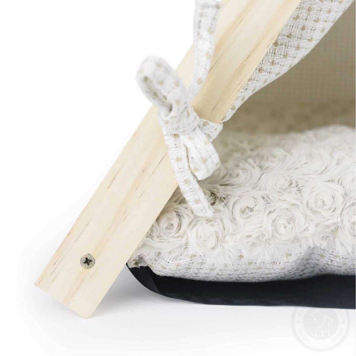 A close-up of the cushion and frame of a Pickle & Polly Pet Tent (White).
